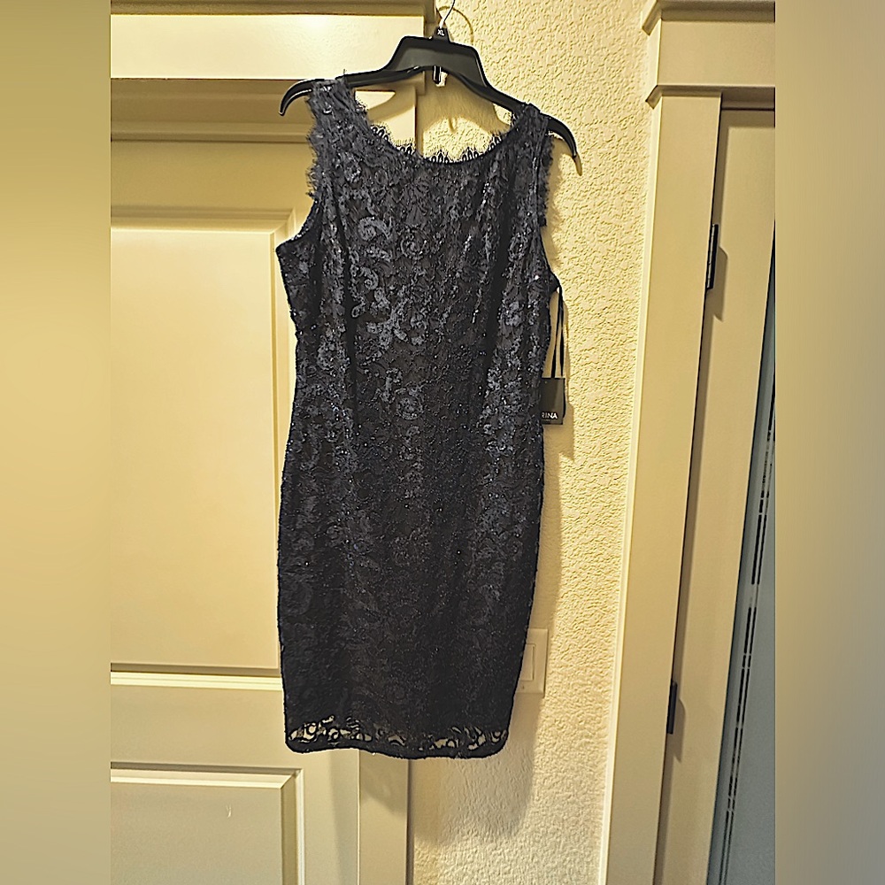 NWT, Woman’s dress size 12. Marina Style # 264844 Cut# 12124, Navy Sequin Dress